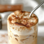 French toast iced latte with cinnamon foam in glass